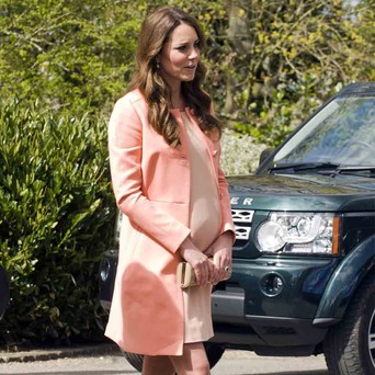 Kate looks positively peachy in this pastel combination.